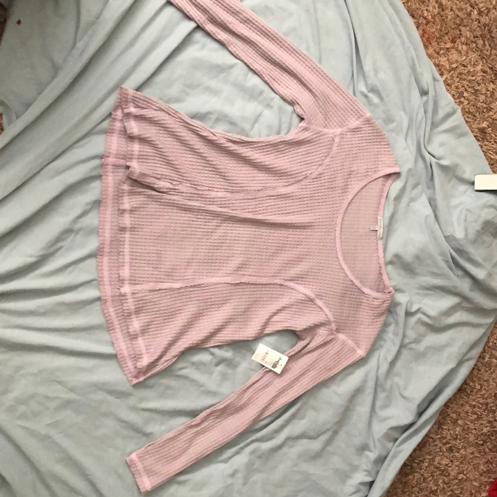 Purple long sleeved t shirt.